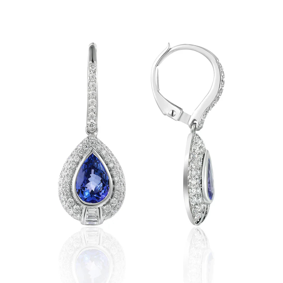Precious stone teardrop cut earrings surrounded by a diamond halo. Effortless beauty for everyday
