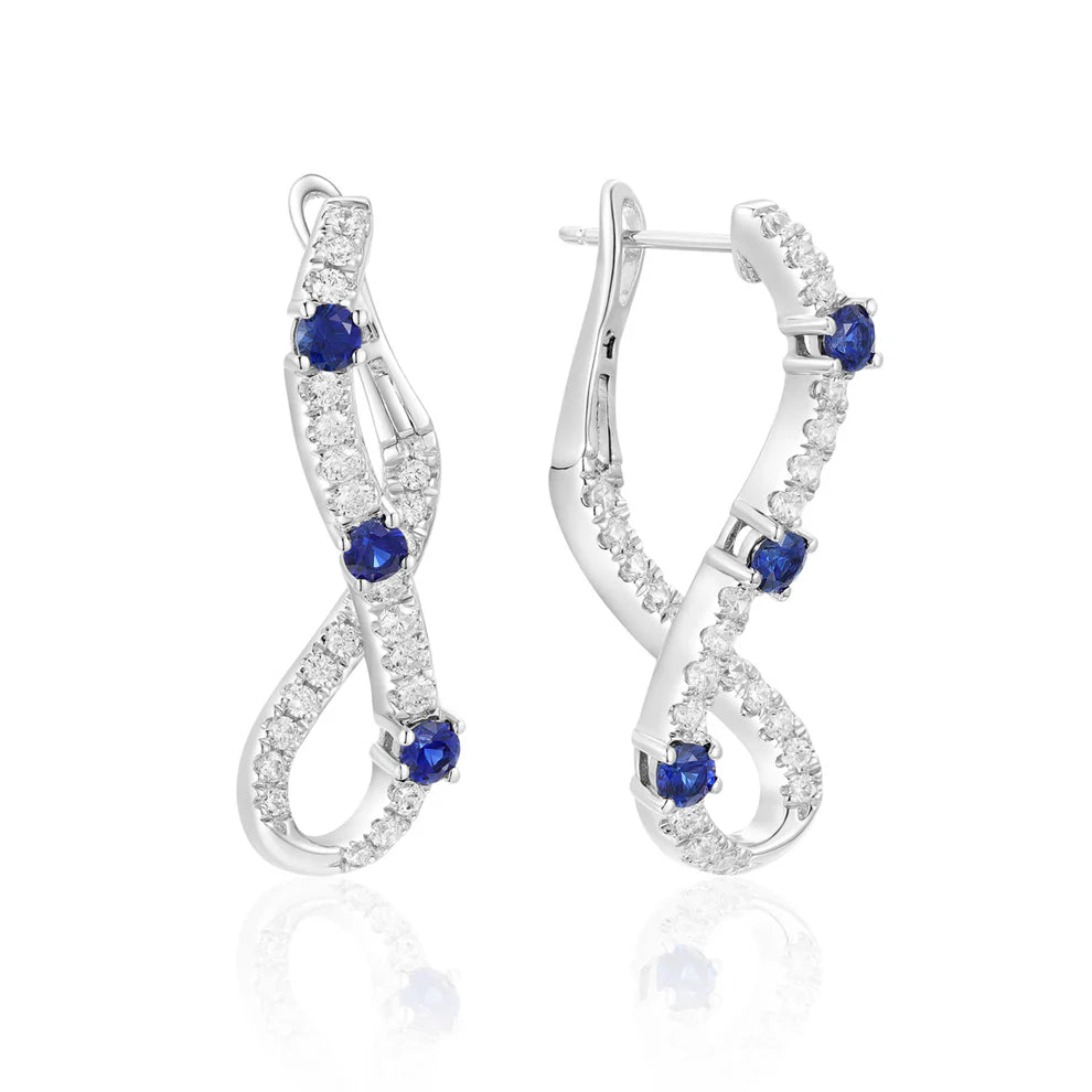 Discover elegance with Abstract Infinity Whirl Earrings, with Diamond and Precious stones.