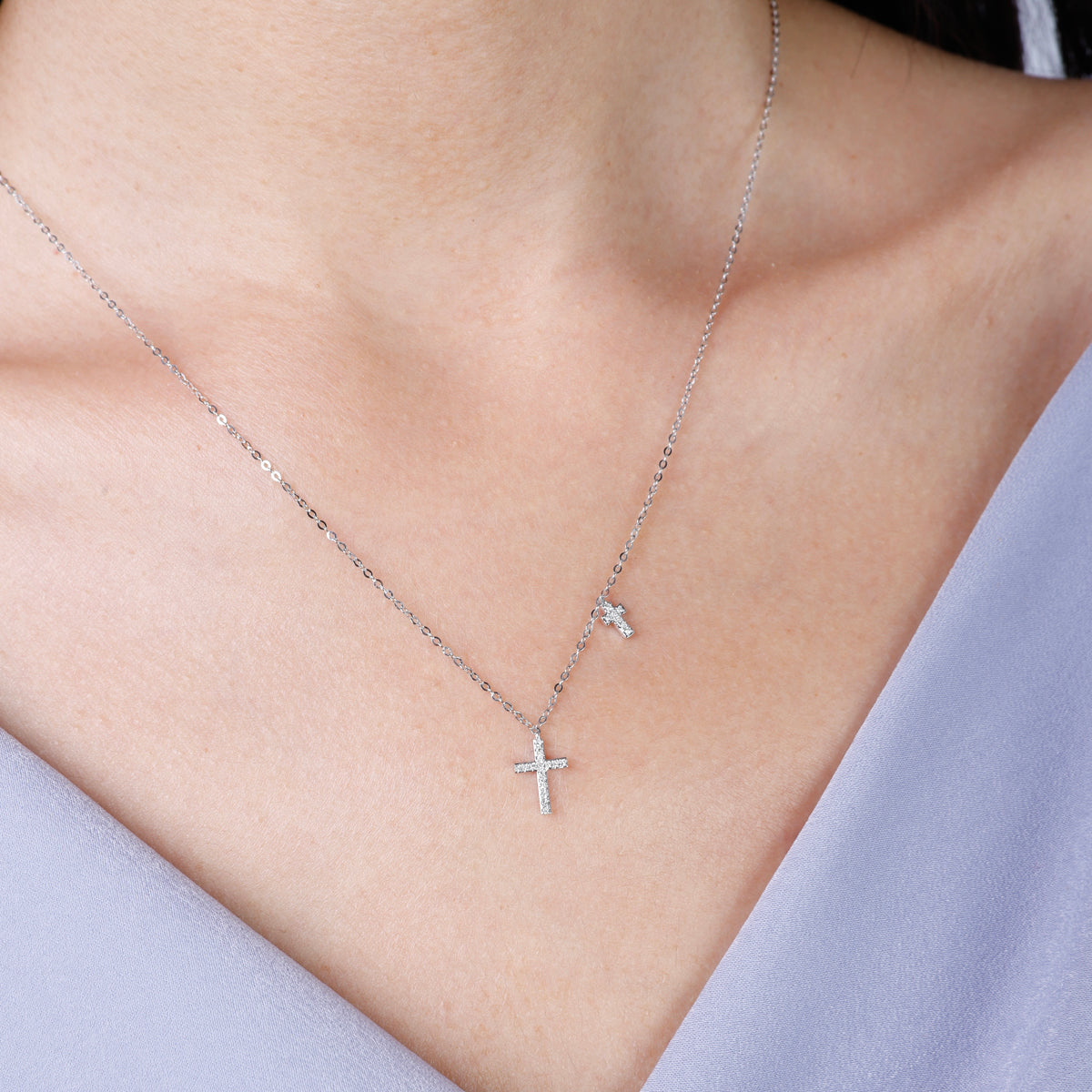 Intricately designed cross and charm add a touch of finesse and elegance. Perfect for everyday