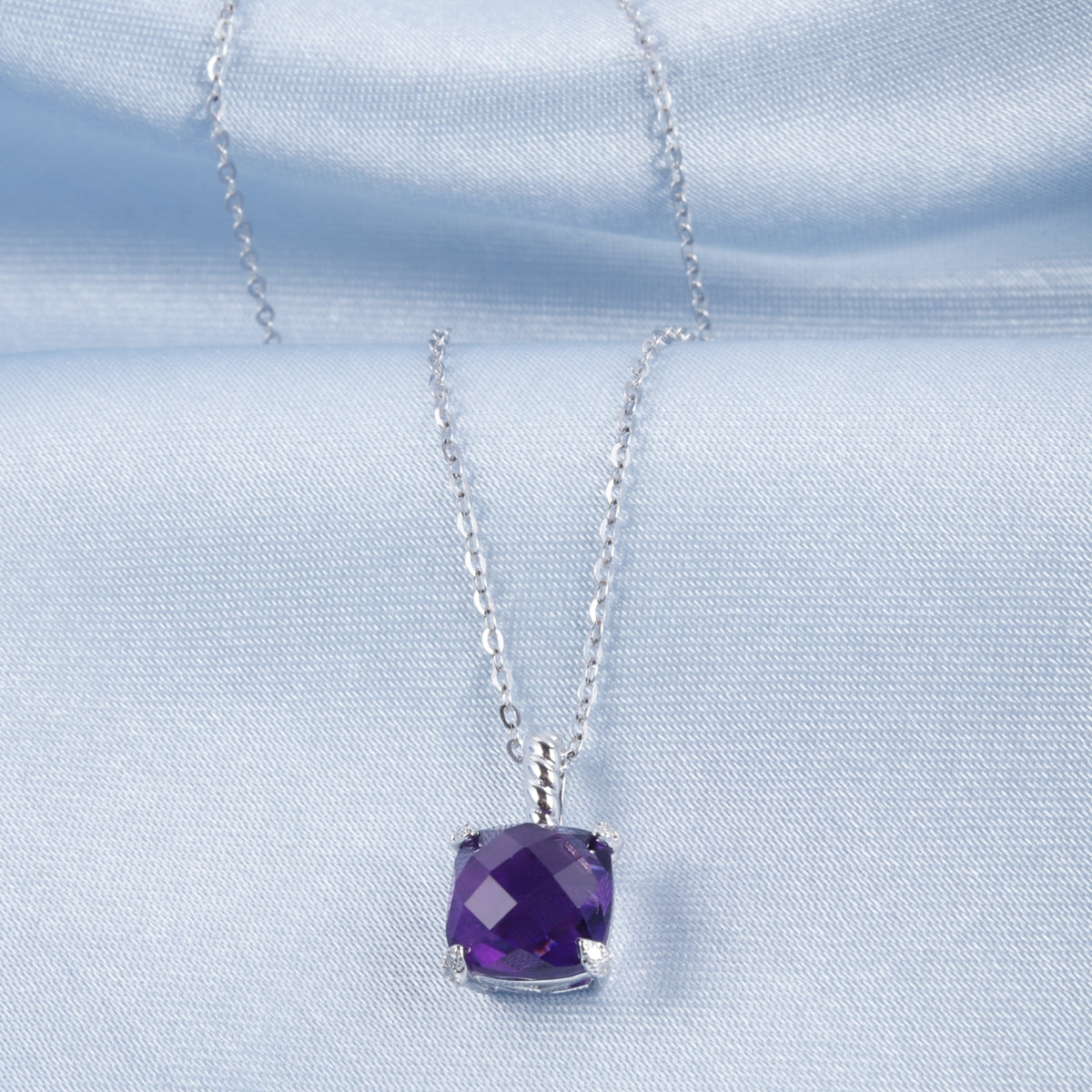 Braided Princess Cut Necklace features gemstone with a braided bail that creates elegance. 