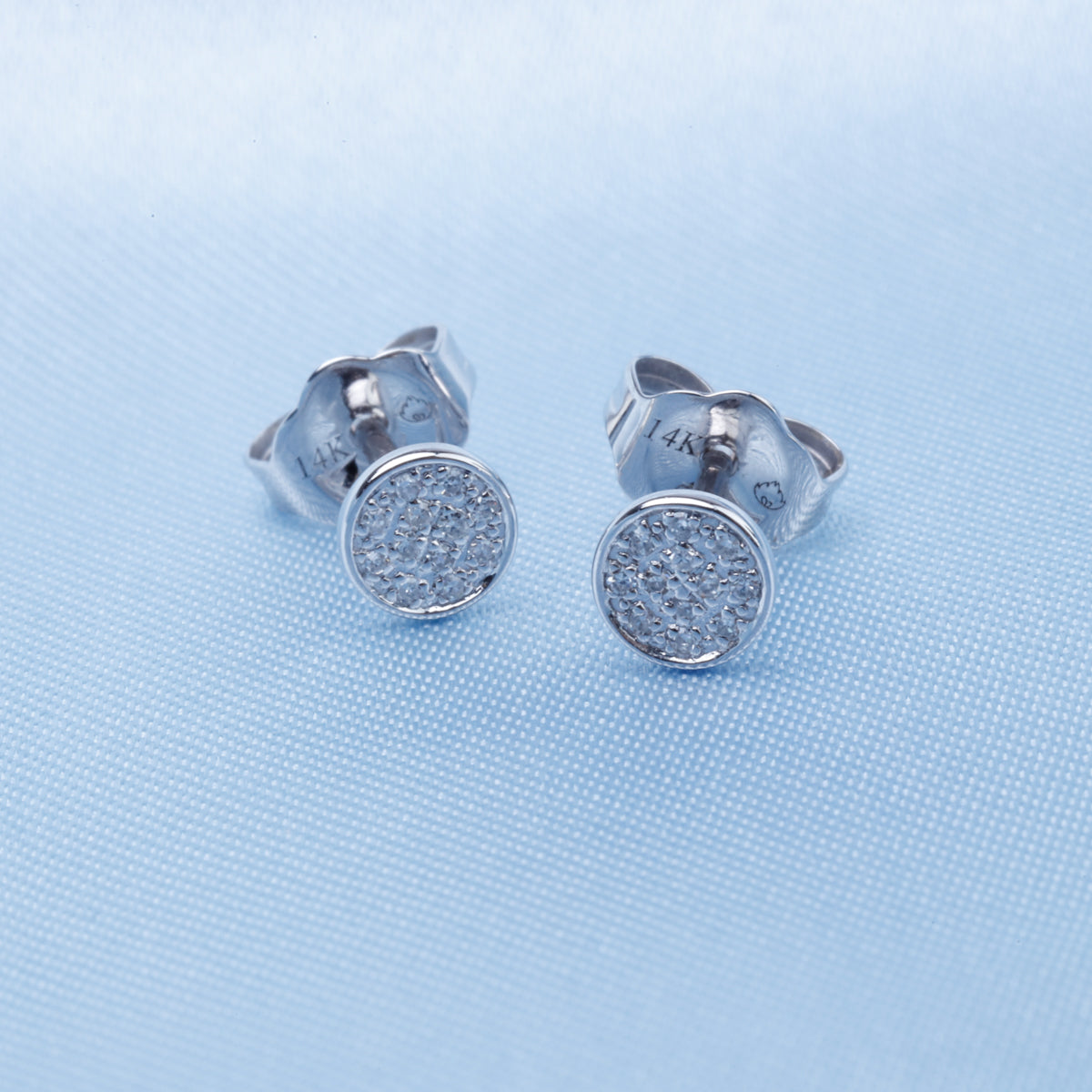 Simple & classic circle stud that exude elegance. Encrusted with pave diamonds, perfect for everyday