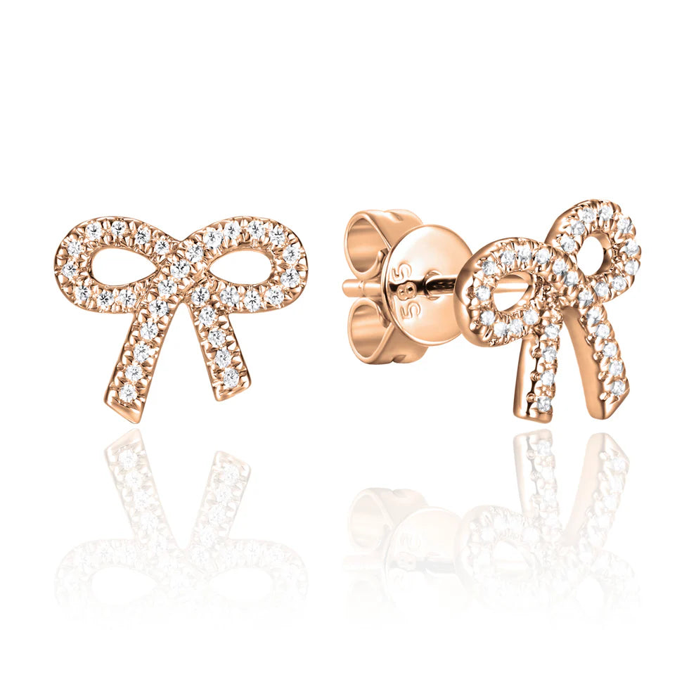 Simple and elegant bow studs with diamonds all around. Secure fitting, perfect for everyday. 