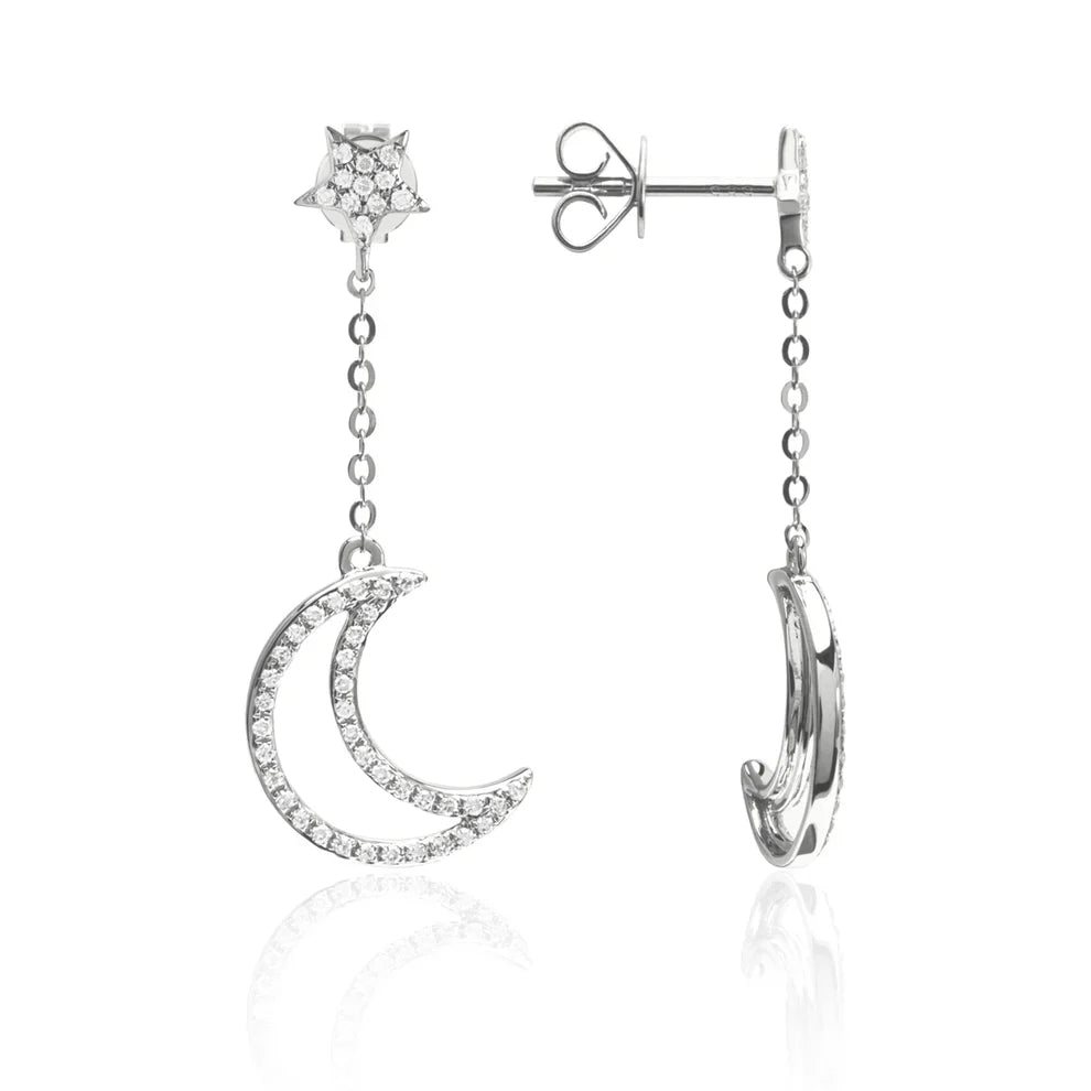 Diamond Dangle Earring showcasing a crescent. Capturing majestic allure with embellished diamonds