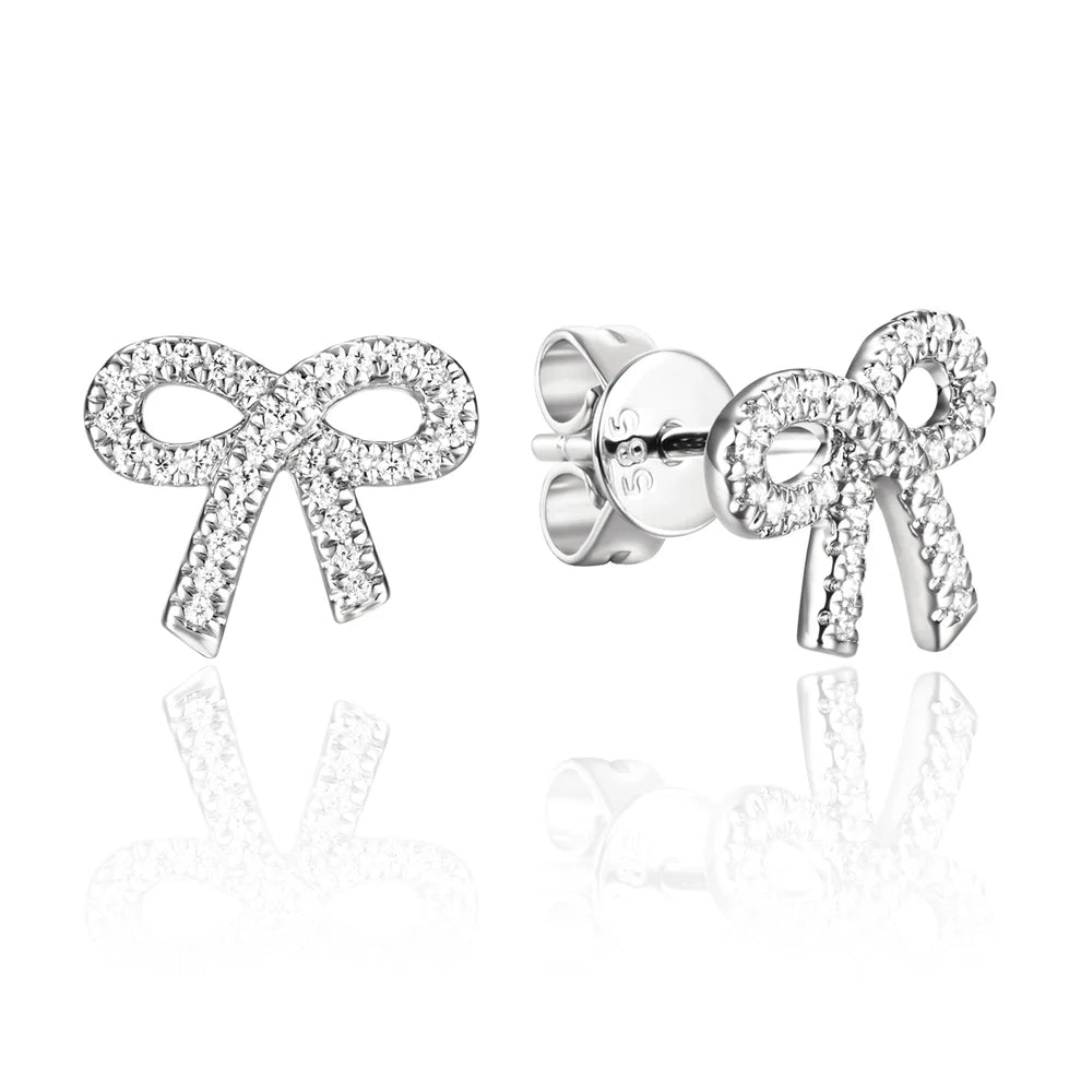 Simple and elegant bow studs with diamonds all around. Secure fitting, perfect for everyday. 