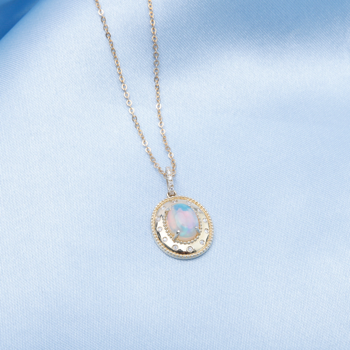 Chunky Opal Necklace in a robust chain and a gleaming opal with chunky pendant surrounding