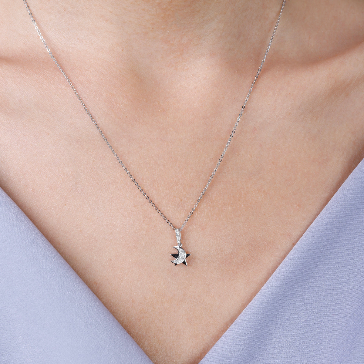 Captivating inspired cosmo necklace with a diamond moon/star. An illuminating essence for everyday