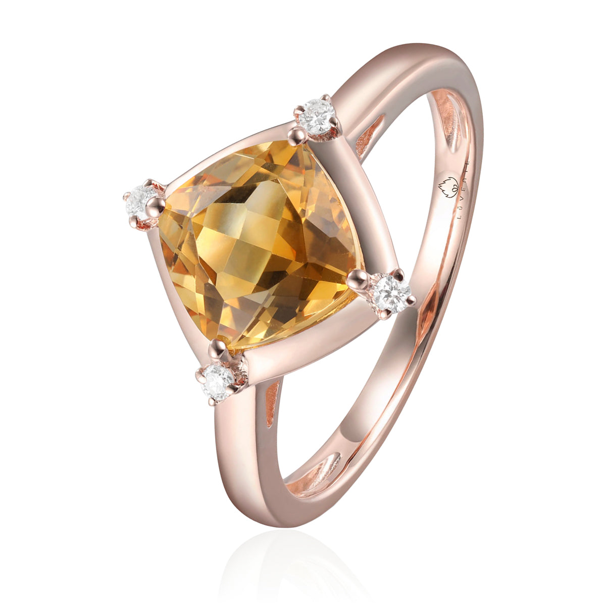 Stunning ring with a gemstone at an angle with diamonds at each corner to accentuate its color. 
