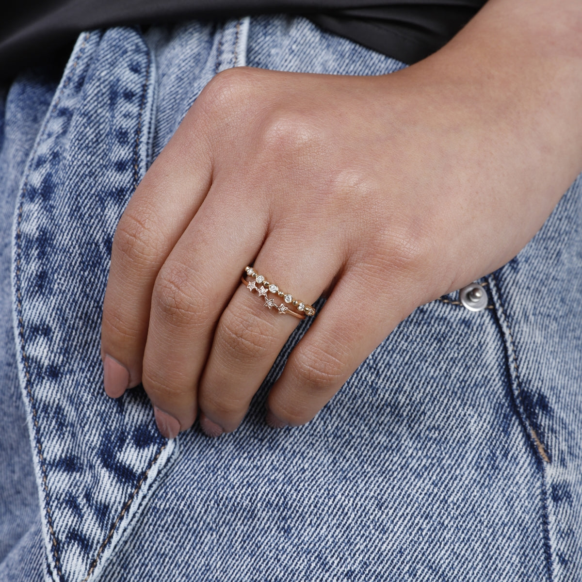 Bethany Ring is a perfect dainty ring to elevate your stack. Crafted with accents of round diamonds