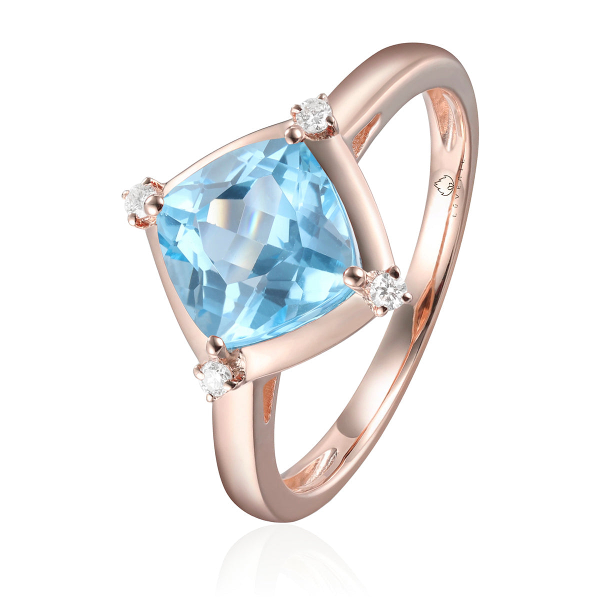 Stunning ring with a gemstone at an angle with diamonds at each corner to accentuate its color. 