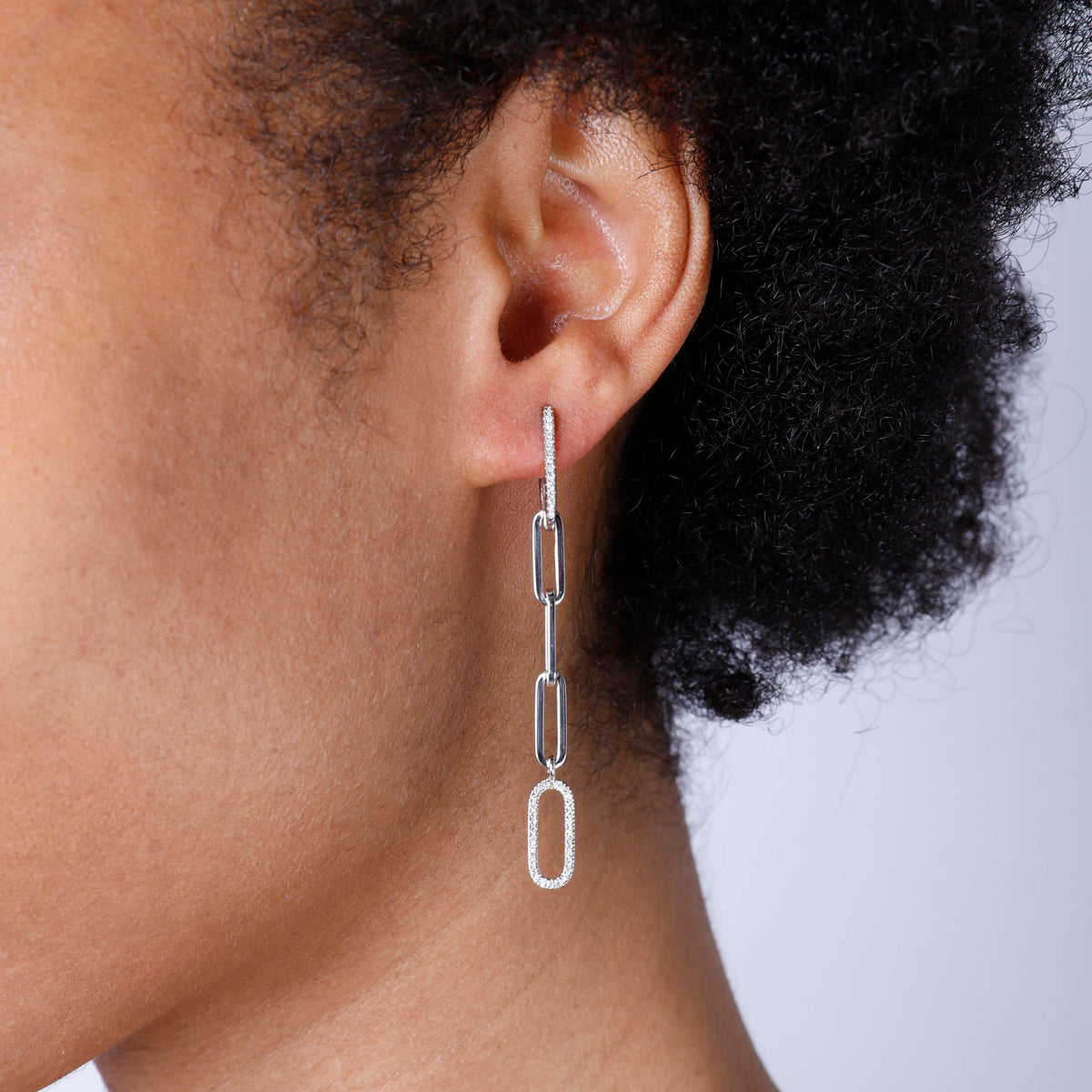 Paperclip Chain style earrings that dangle. Diamonds on some of the links to make them stand out. 