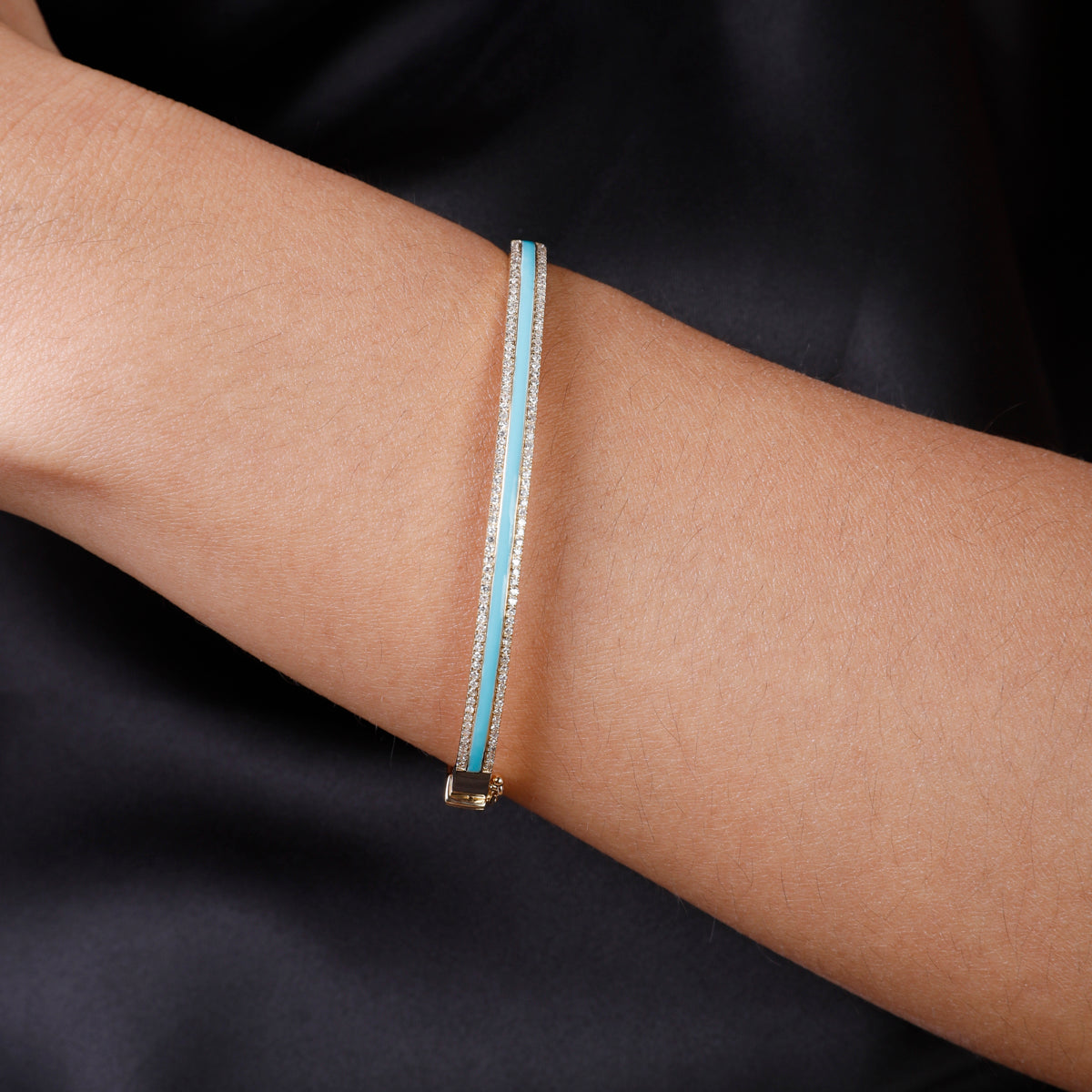 Enamel bangle with a row of diamonds. A pop of color to enhance the vibrant enamel color.