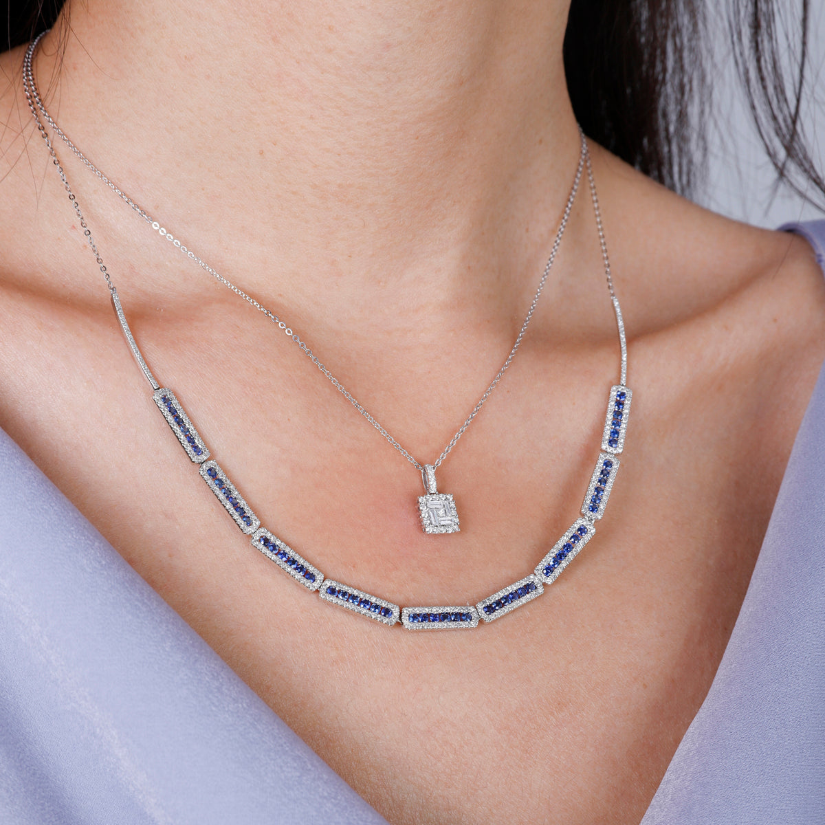 Delicate halo design and secure closure, with a variety of precious options. 