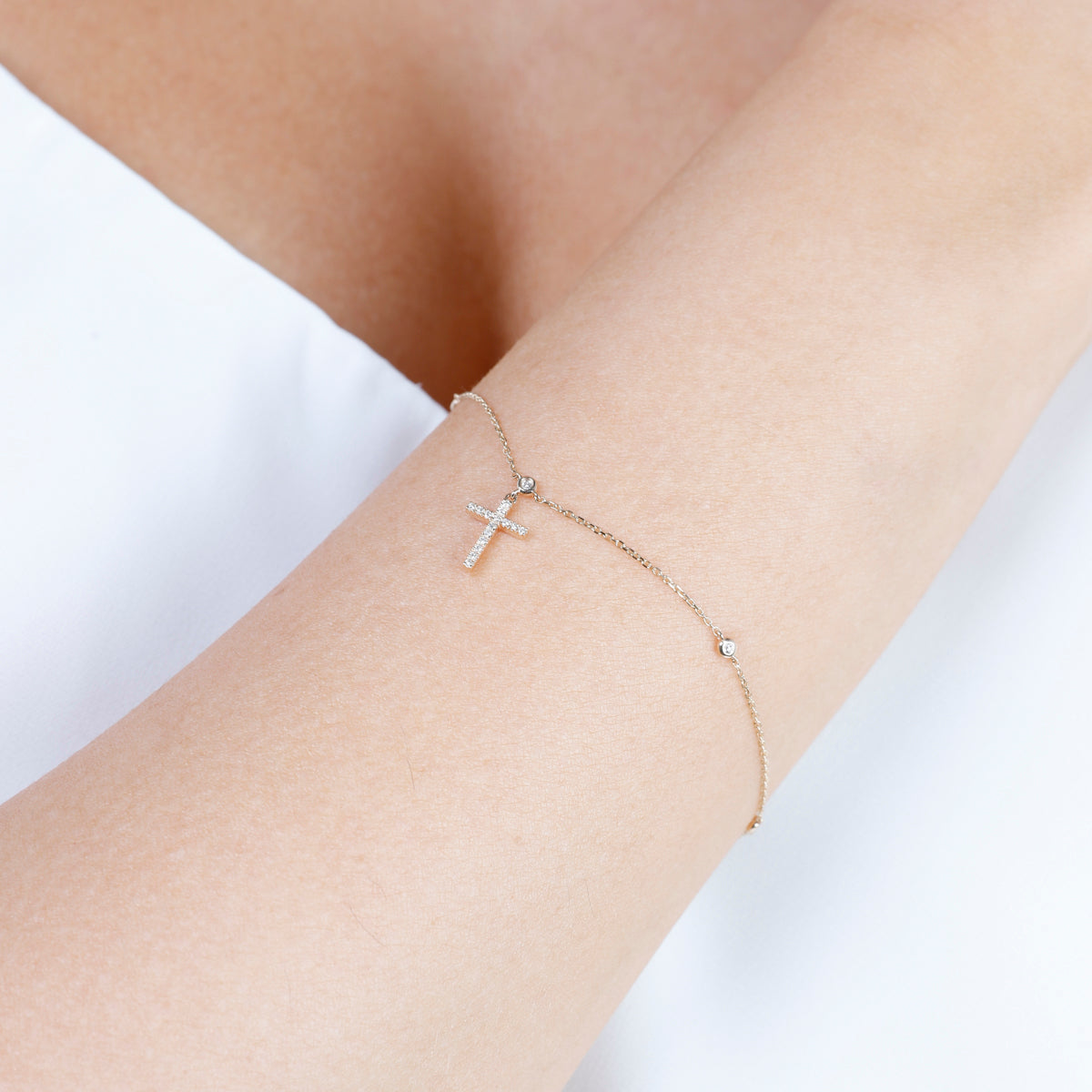 Classic pairing of a gold cross and rosary beads perfect for everyday. 