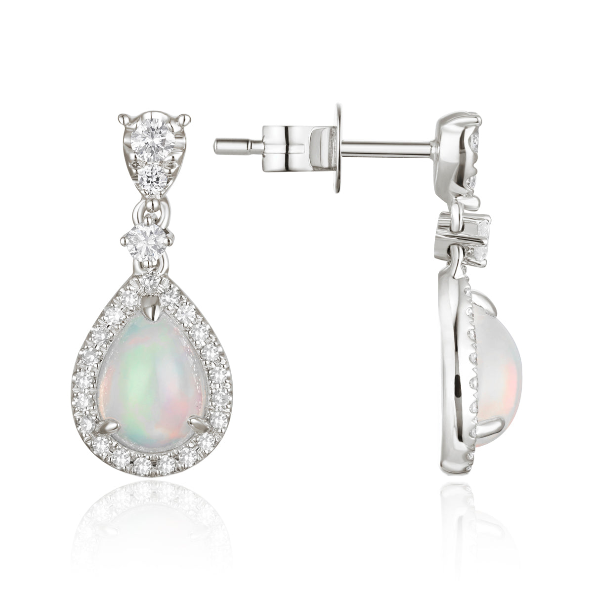 Opal Earrings in a dangle design with a diamond halo. Timeless and effortless beauty. 