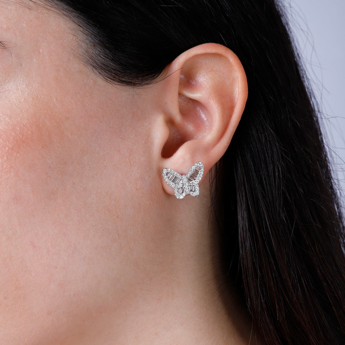 Elegant butterfly studs, their unique shape-baguette diamonds will spark at every angle.