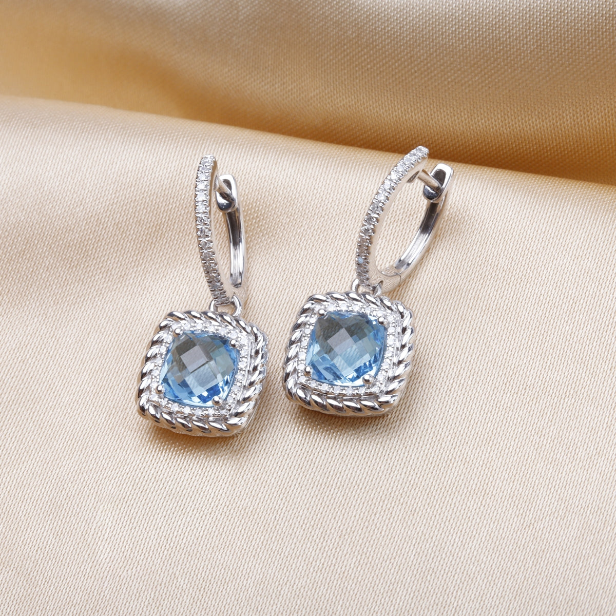 Braided Cushion Cut Earring, gemstone surrounded by a halo of pave diamonds and braided perimeter
