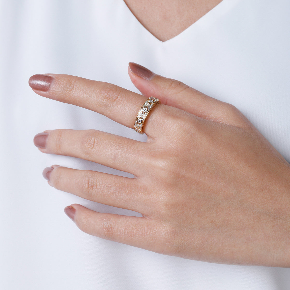 Clover Pave Ring features a delicate four-leaf clover dome design adorned with a paves diamonds