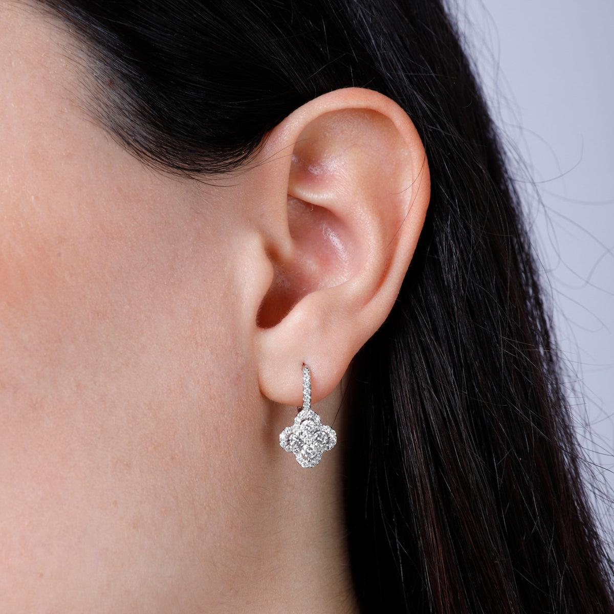 Handcrafted earrings with diamonds in a stunning cluster design. 