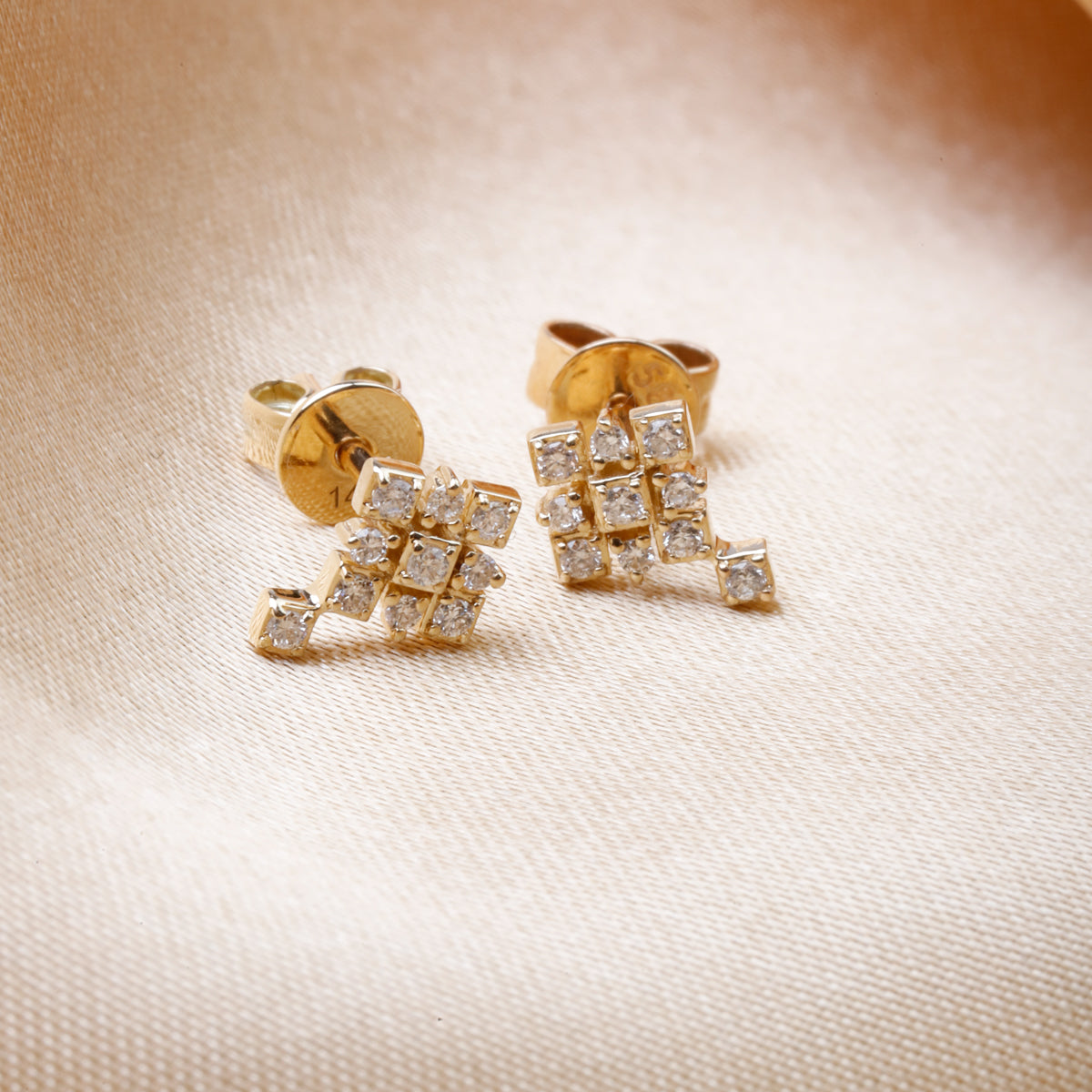 Slim cross accent studs with diamonds will enhance your look and add subtle sparkle.