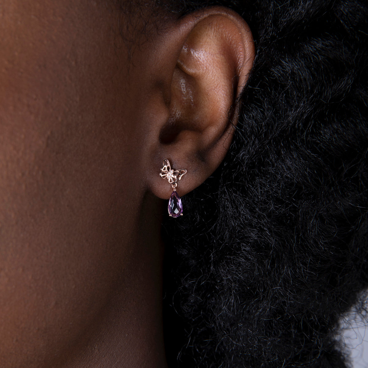 Unique butterfly design with diamonds & mix of gemstones for a subtle pop of color. Timeless beauty.