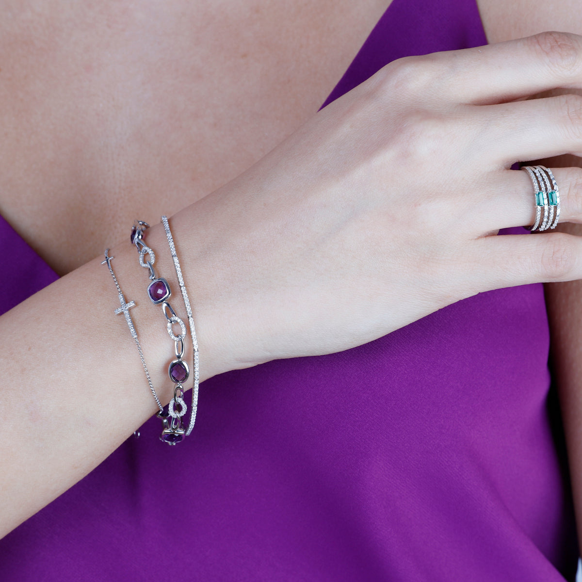 Modern shape in alternating pave diamond links with a variety of gemstones  for self-expression. 