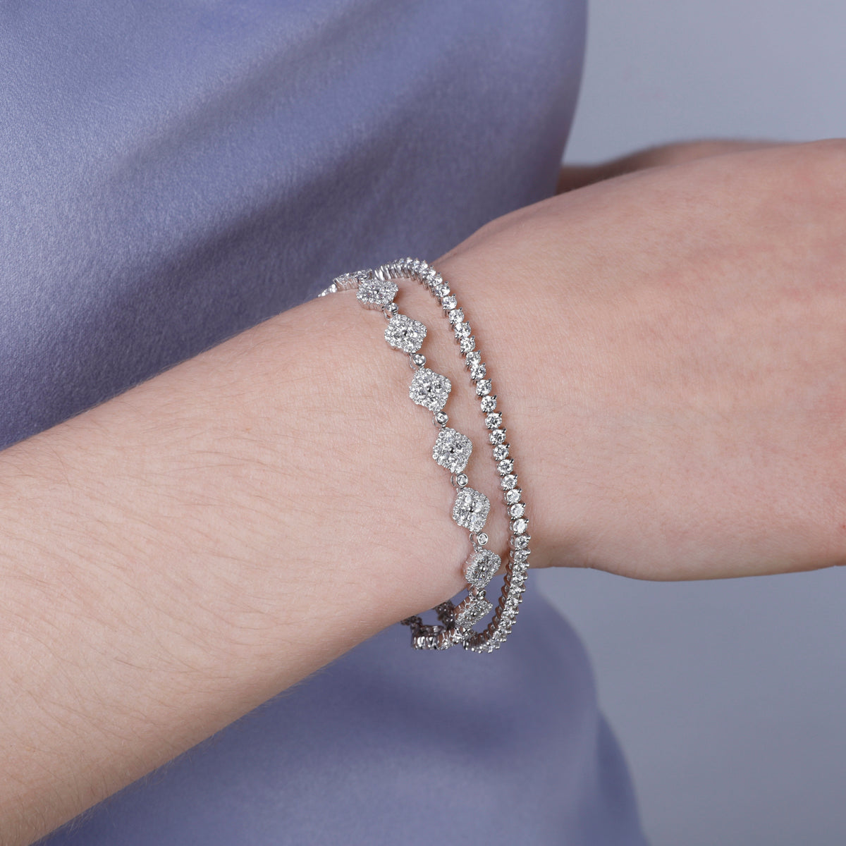 Timeless clover inspired bracelet with precious stones and a diamond halo. Crafted with attention. 