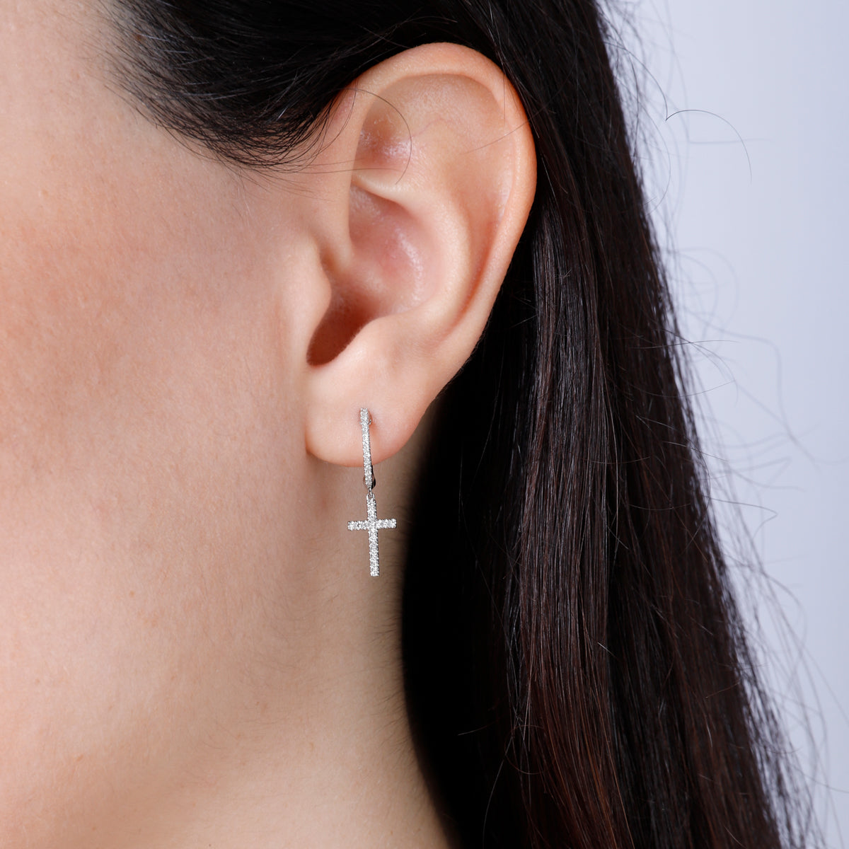 Dangle Cross Earrings for everyday use. Secure closure and shimmering diamonds. 