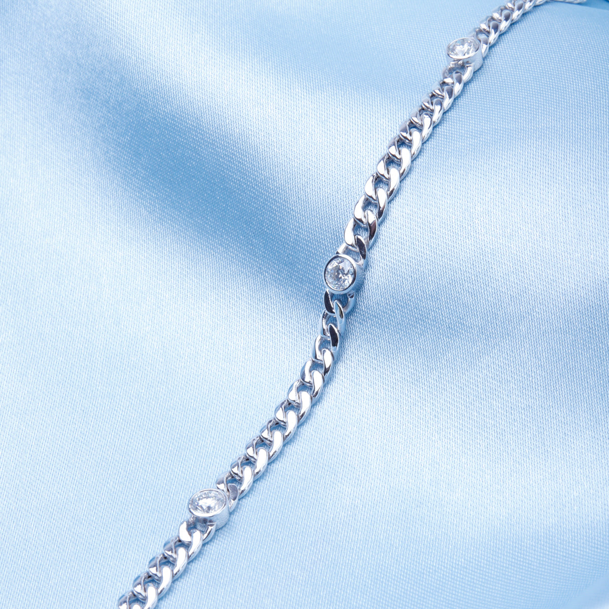 Diamond chain bracelet is a timeless piece made with a high polish finish and bezel design.