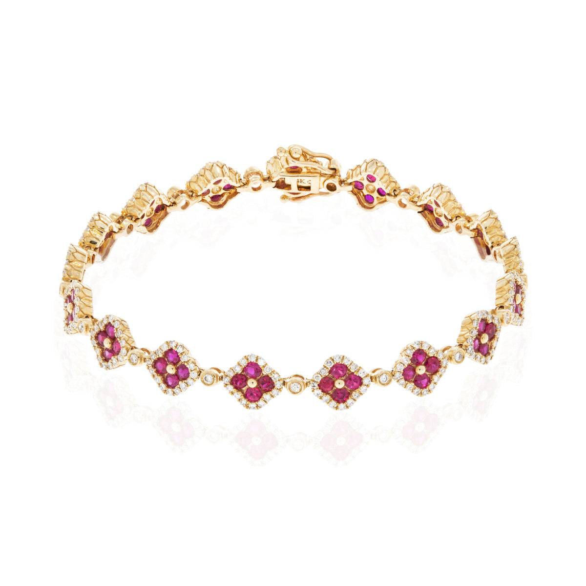 Timeless clover inspired bracelet with precious stones and a diamond halo. Crafted with attention. 