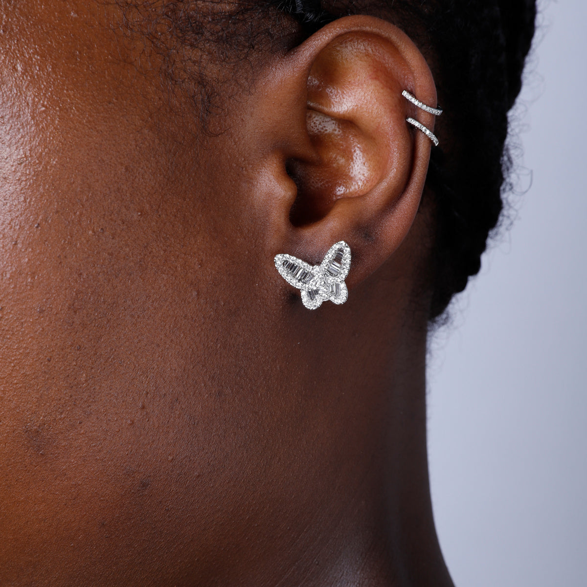 Elegant butterfly studs, their unique shape-baguette diamonds will spark at every angle.