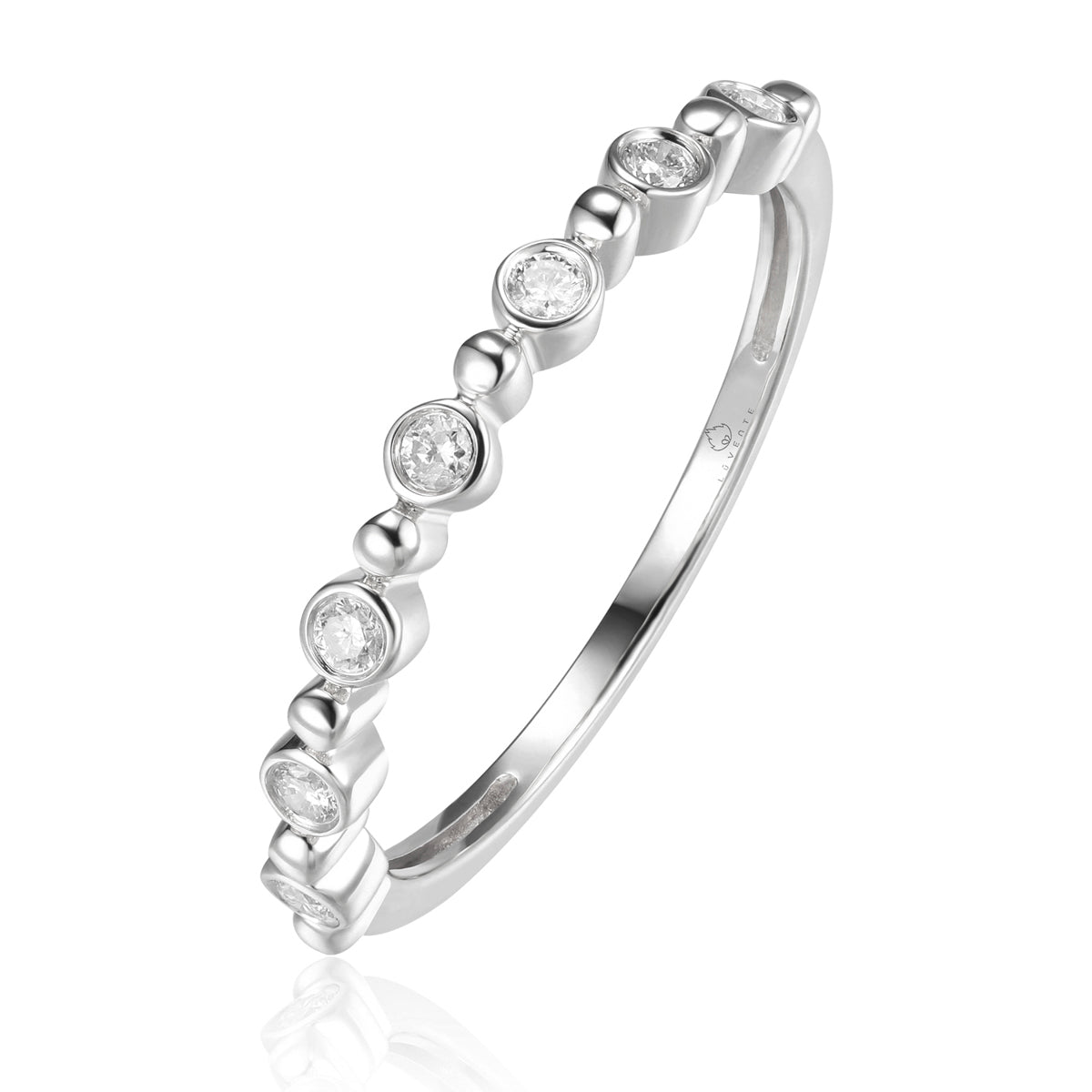 Bethany Ring is a perfect dainty ring to elevate your stack. Crafted with accents of round diamonds