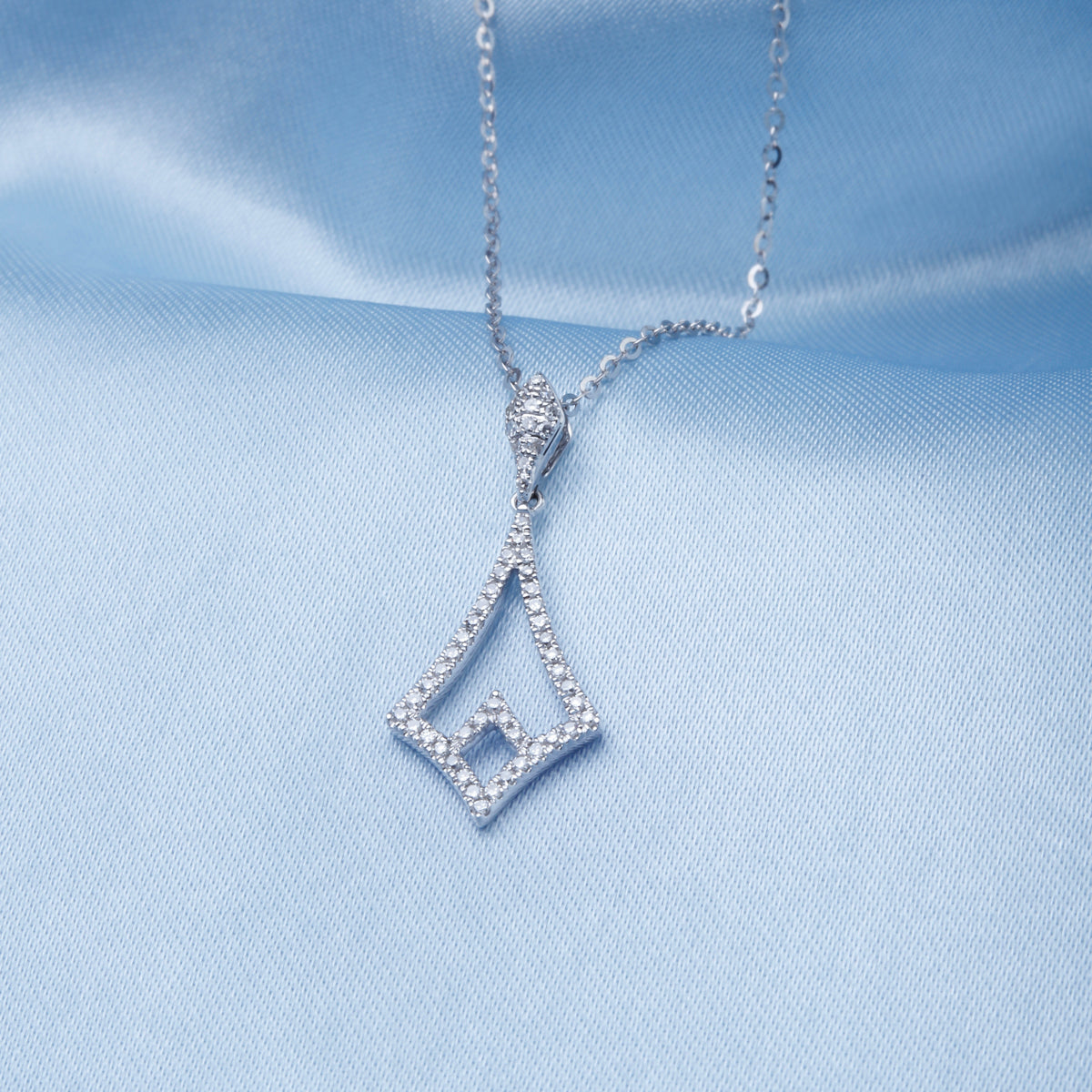 Chandelier Diamond Necklace, glimmering diamonds all around its shape for those special night outs