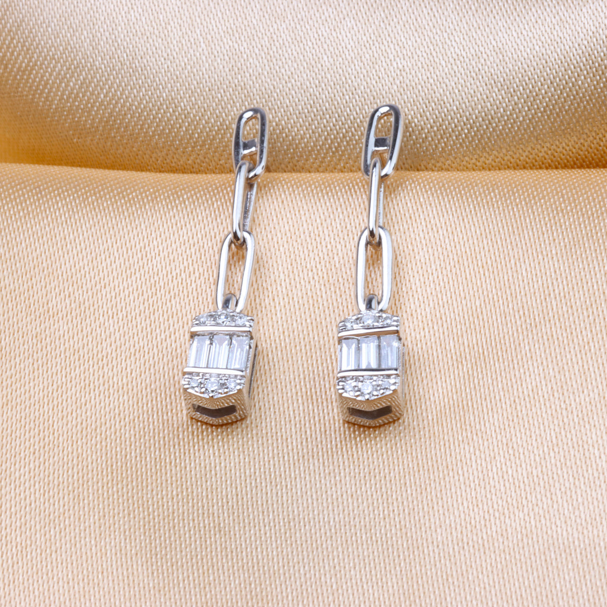 Chain Baguette Drop Earrings,  baguette-cut gemstones and delicate chain drop design.