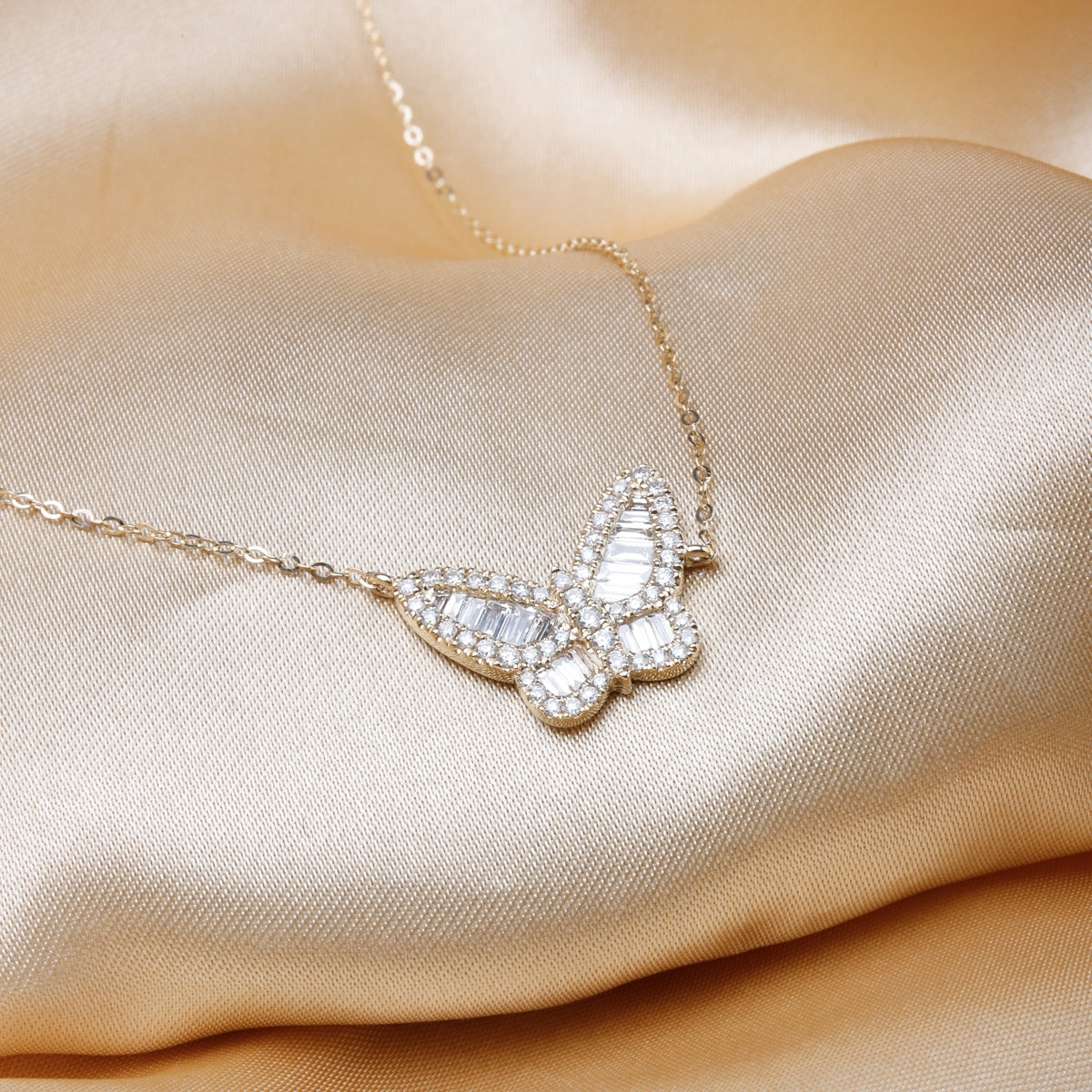 Baguette Diamond Butterfly Necklace designed with detail,14k gold and adorned with baguette diamonds