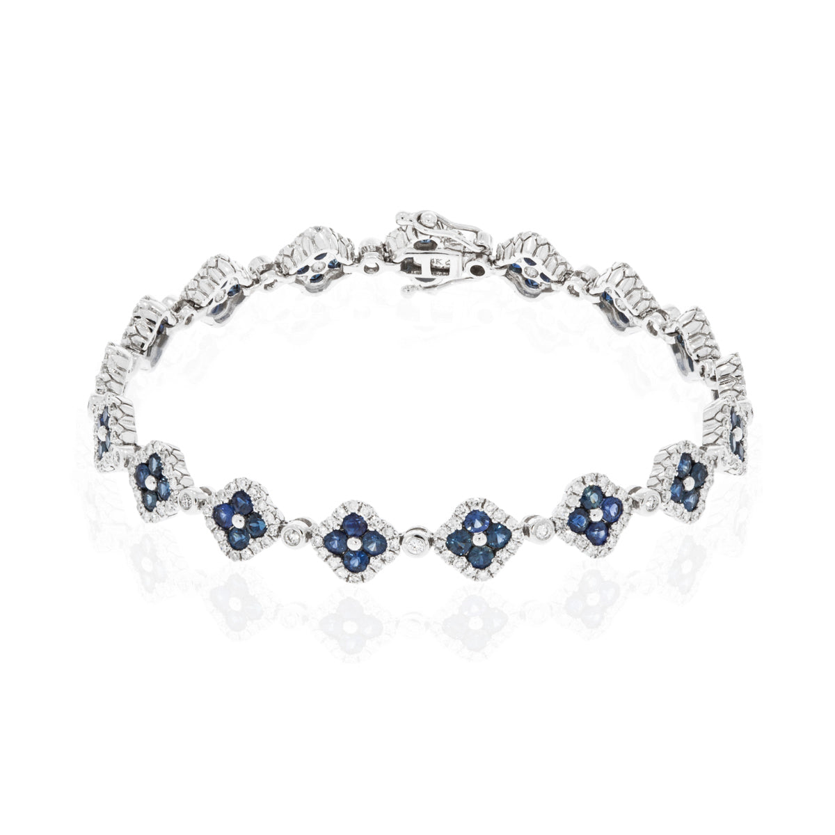 Timeless clover inspired bracelet with precious stones and a diamond halo. Crafted with attention. 