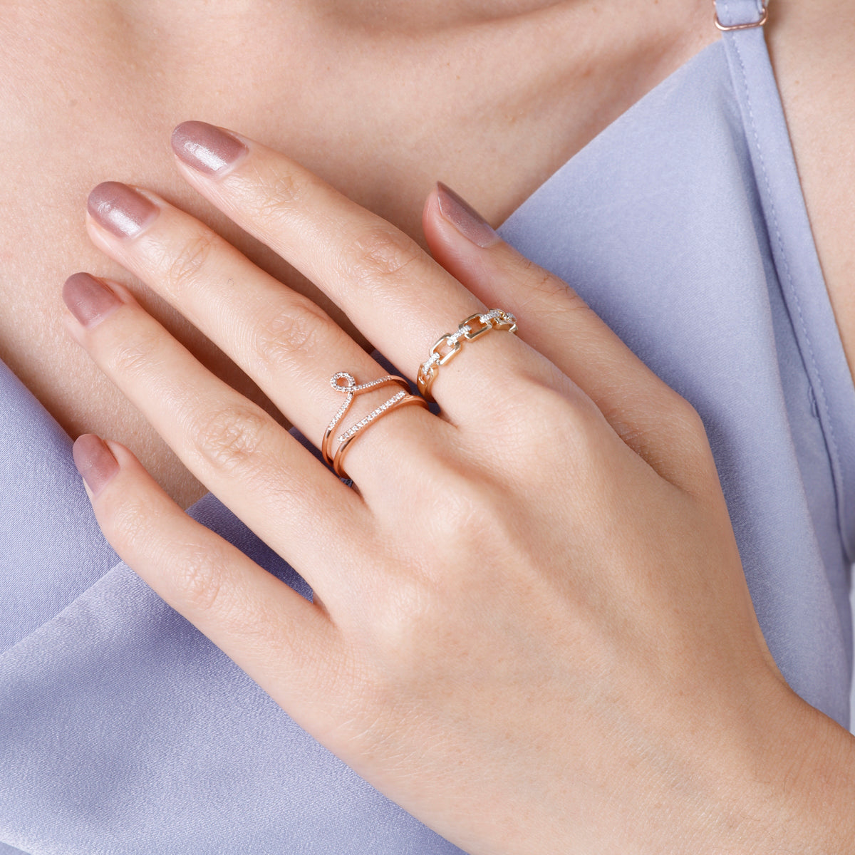 Stunning round cut diamond pave around an interlinked chain ring. Timeless beauty for everyday