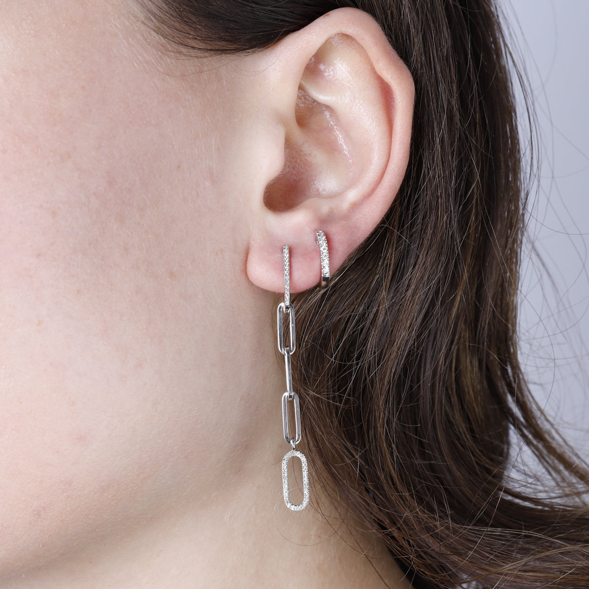 Paperclip Chain style earrings that dangle. Diamonds on some of the links to make them stand out. 