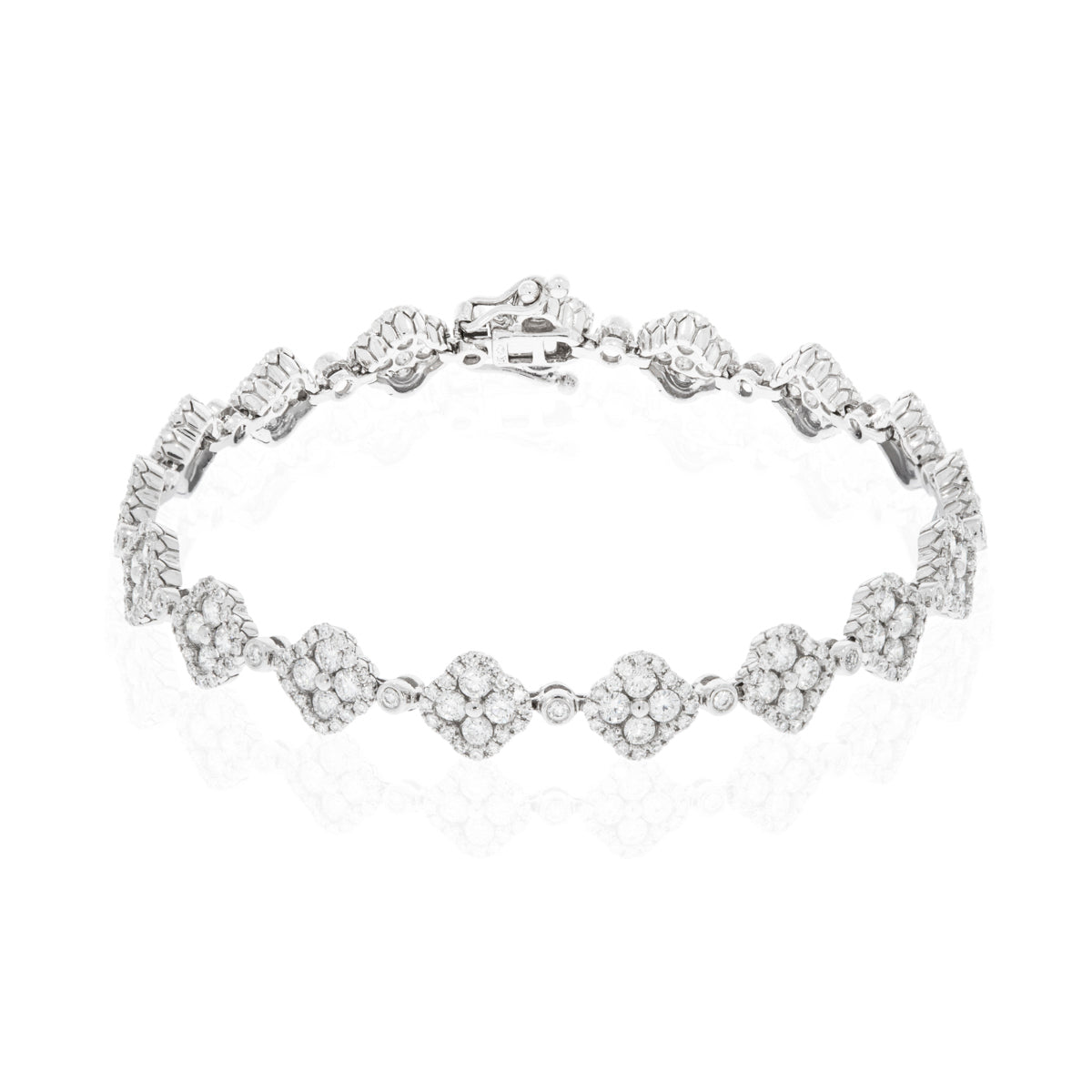 Timeless clover inspired bracelet with precious stones and a diamond halo. Crafted with attention. 