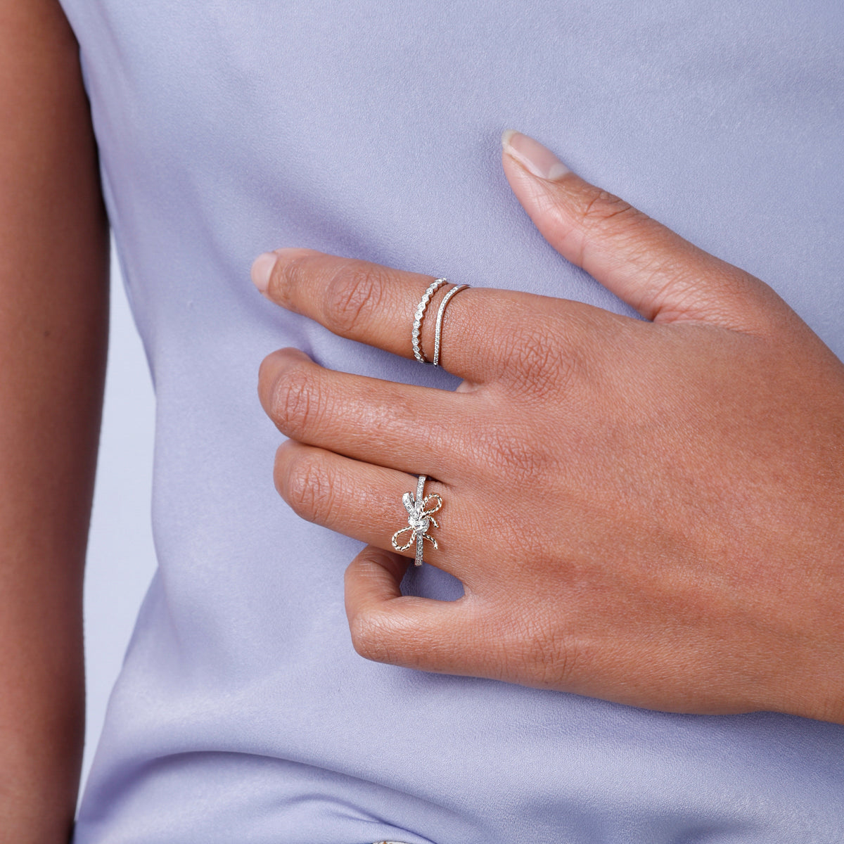 Bow Rope Ring is a timeless piece that has a distinctive bow-shaped with a  diamond in its center.