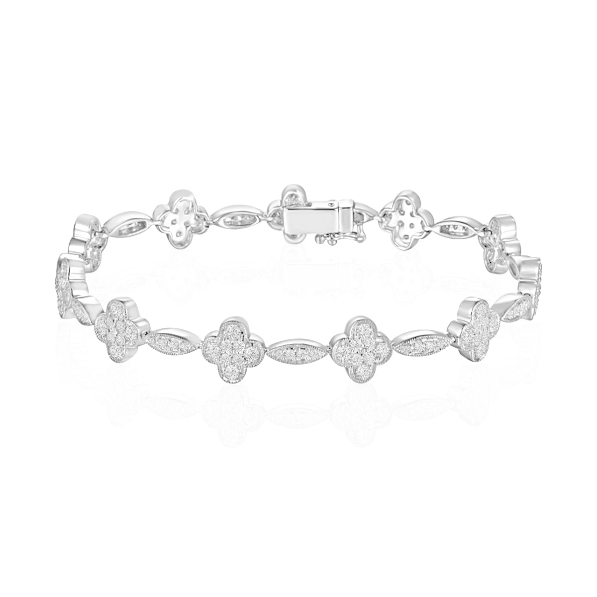 Clover link bracelet with dazzling diamonds in each inspired clover. Link design for timeless allure
