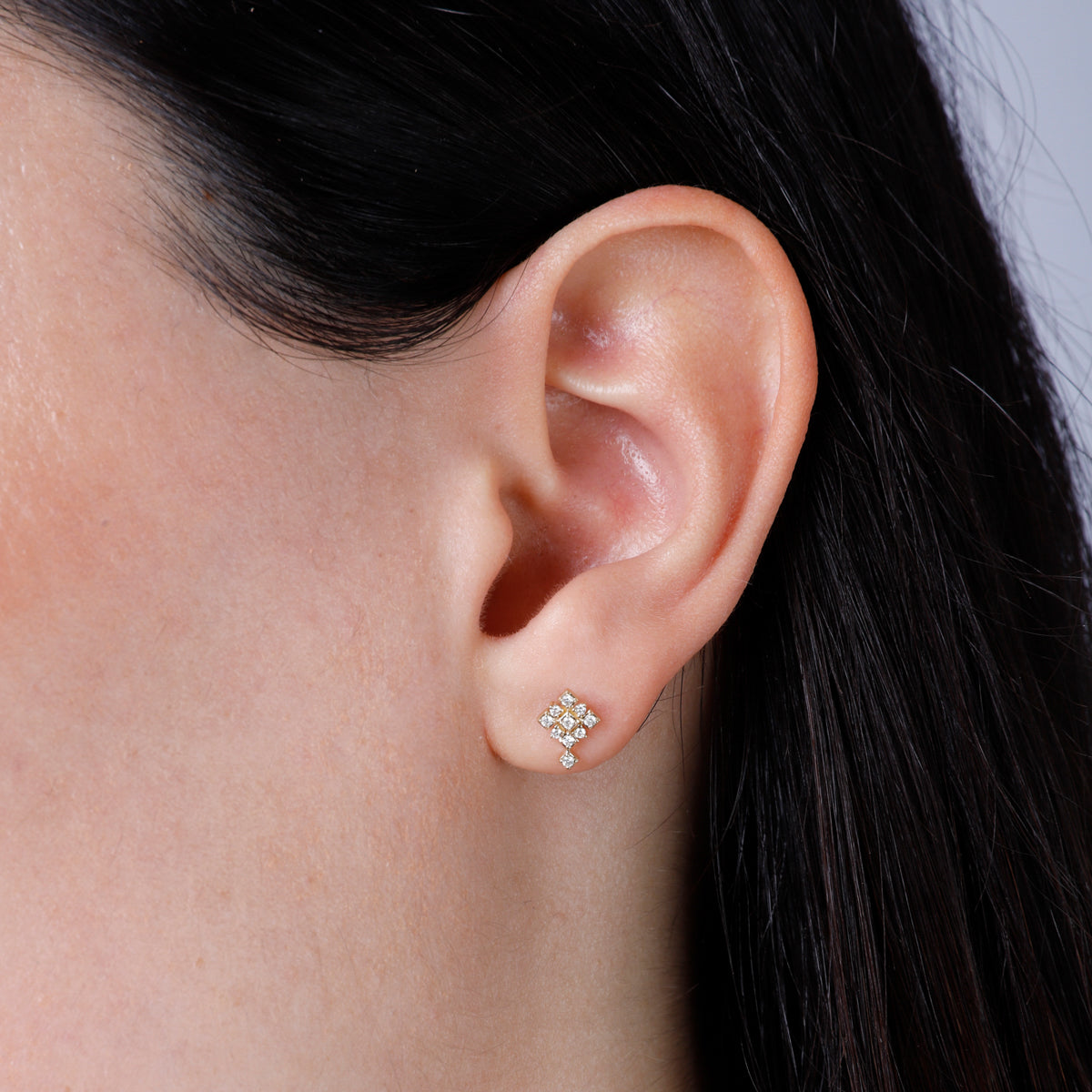 Slim cross accent studs with diamonds will enhance your look and add subtle sparkle.