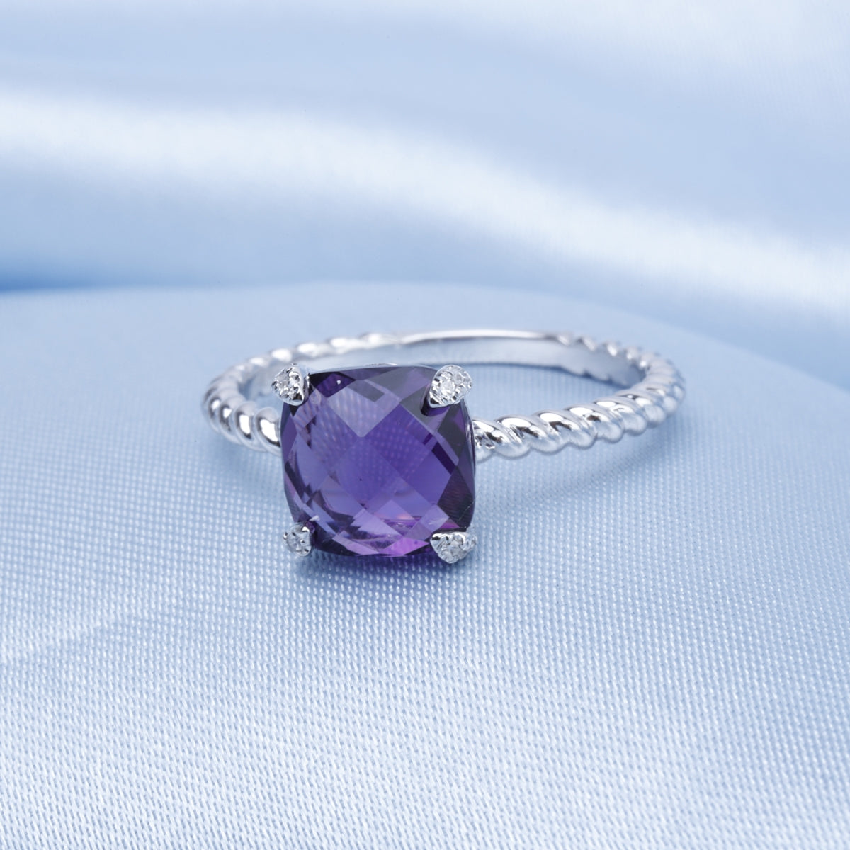 Braided Elegance Princess Cut Ring with gemstone within a braided band, creating a harmonious fusion