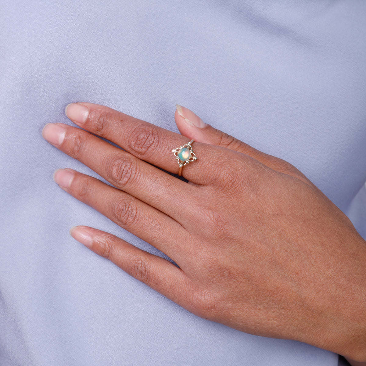 Boho Opal Flower Ring crafted of luxury with its opulent opal center and vibrant petals.