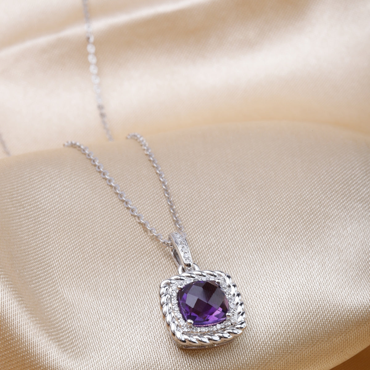 Braided Halo Necklace, gemstone centerpiece with braided halo design, symbolizing endless beauty.