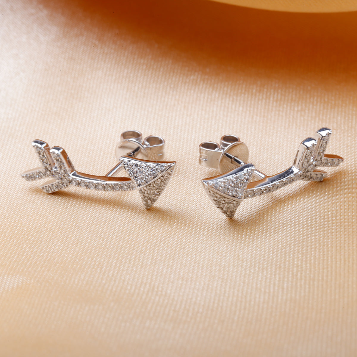 Stud Arrow Earrings are crafted with precision and style. Add a touch of sophistication.