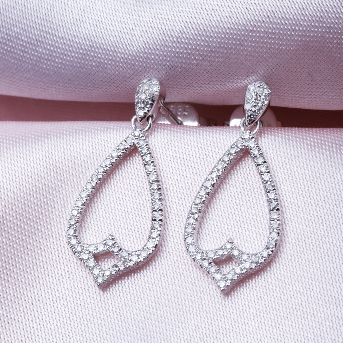 Classic Open Frame Diamond Earrings with a dangle design to sway and display a luxurious shine. 