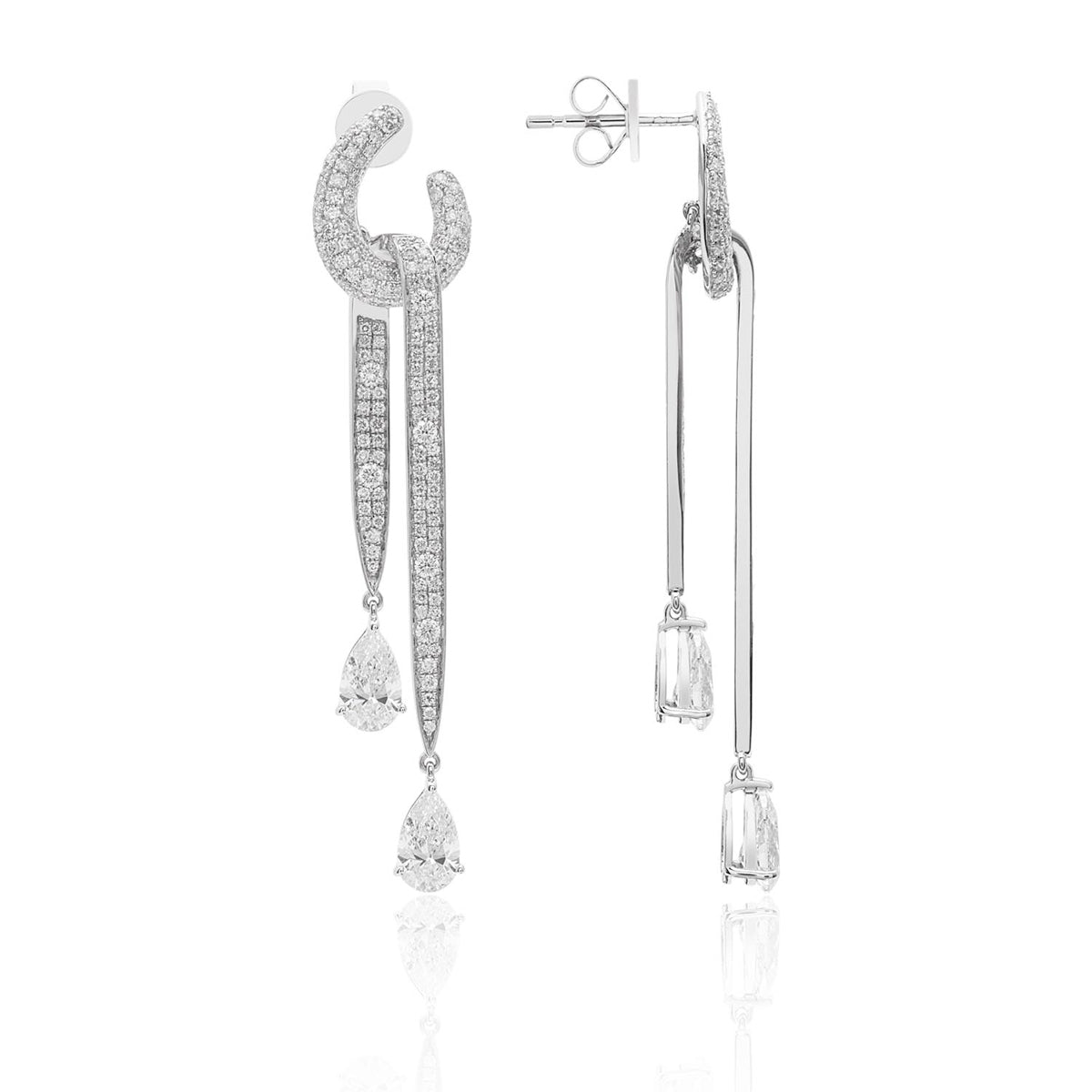 Bold diamond dangle earrings embellished with pear shaped diamonds and other pavé diamonds. 