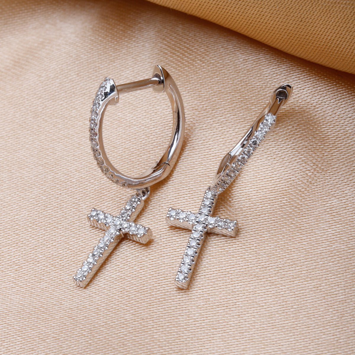 Dangle Cross Earrings for everyday use. Secure closure and shimmering diamonds. 