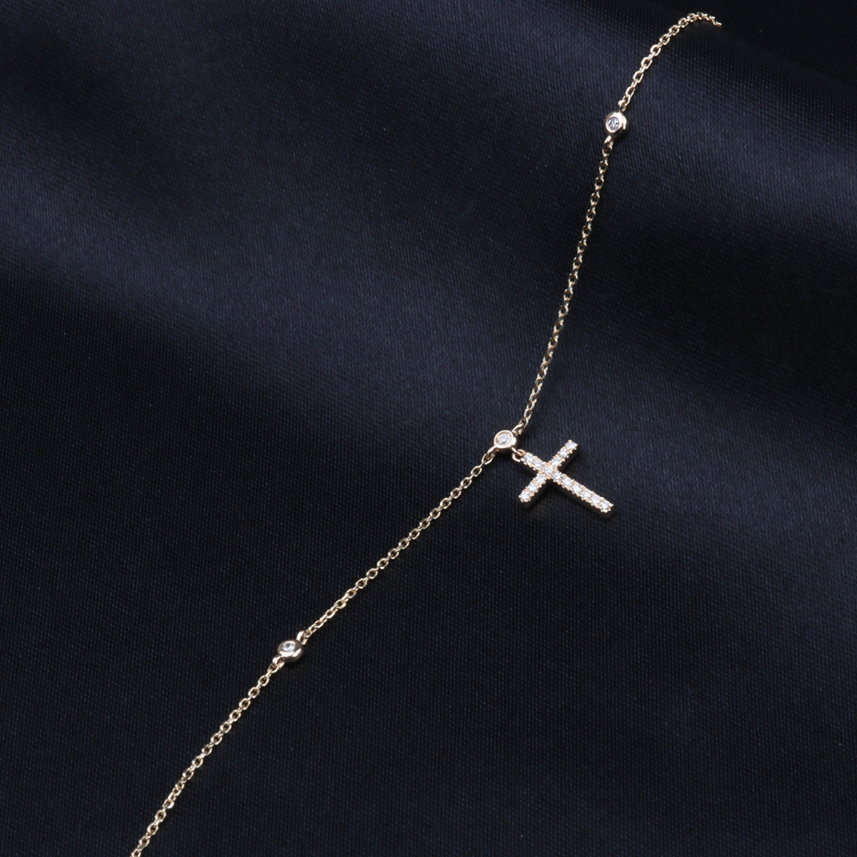 Classic pairing of a gold cross and rosary beads perfect for everyday. 