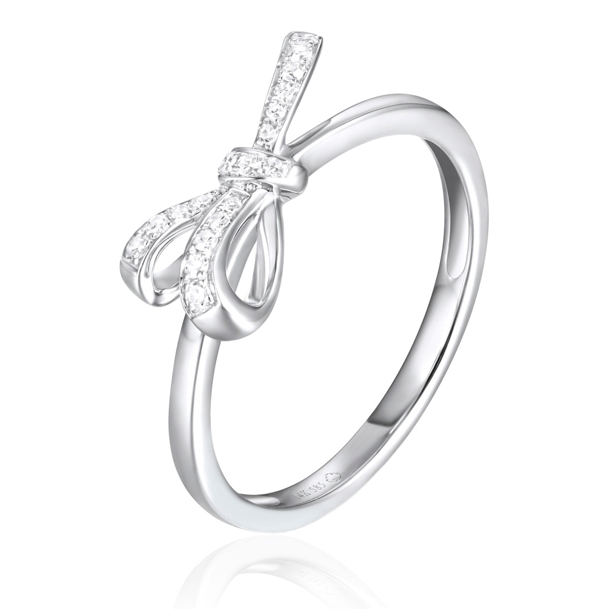 Bow diamond ring is a luminous gold band and a dainty bow set with multiple diamonds.